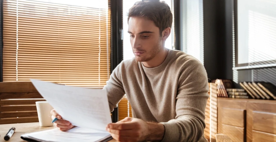 Illustration showing how to read a pay stub with labeled earnings and deductions